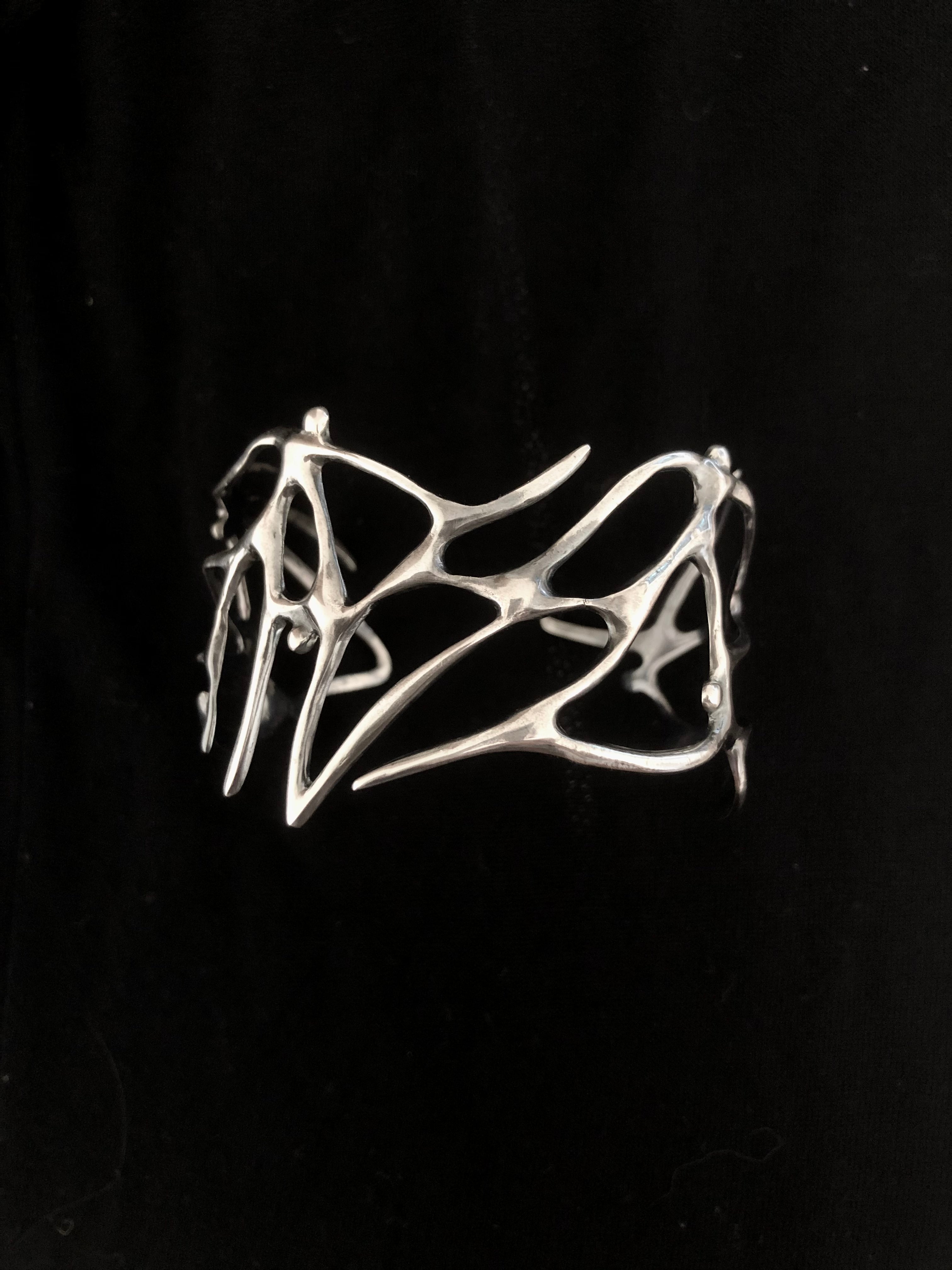 HANDSCULPTED SILVER BRACELET WITH ORGANIC FORMS